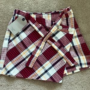 Zara girls. Plaid skort (skirt and short together) with belt attached to it.